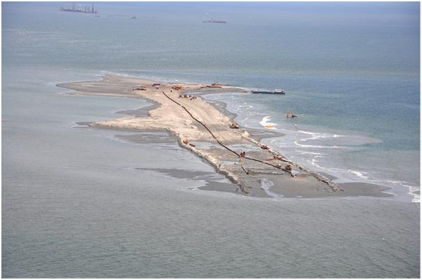 Construction of sand berms in July 2010 along Louisiana coastline on Gulf of Mexico for oil spill protection 