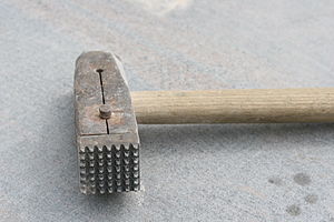 Brush hammer