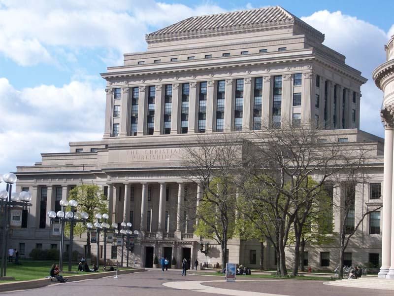 the Christian Science Publishing Society with green open space.